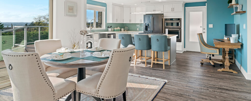 Mixing and matching bar stools and chairs in an open-concept kitchen