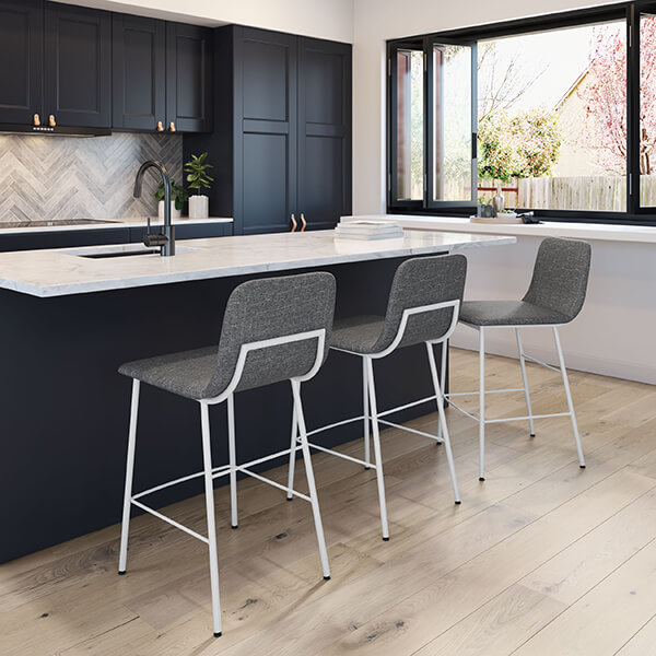 White bar stools with gray upholstery in modern kitchen