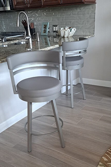 Amisco's Ronny Taupe Swivel Bar Stools in Customer's Kitchen